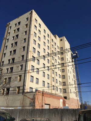 Works is in progress to restore the old Barfield building at Tyler Street and Sixth Avenue as an upscale hotel. [Tim Howsare/Amarillo Globe-News]