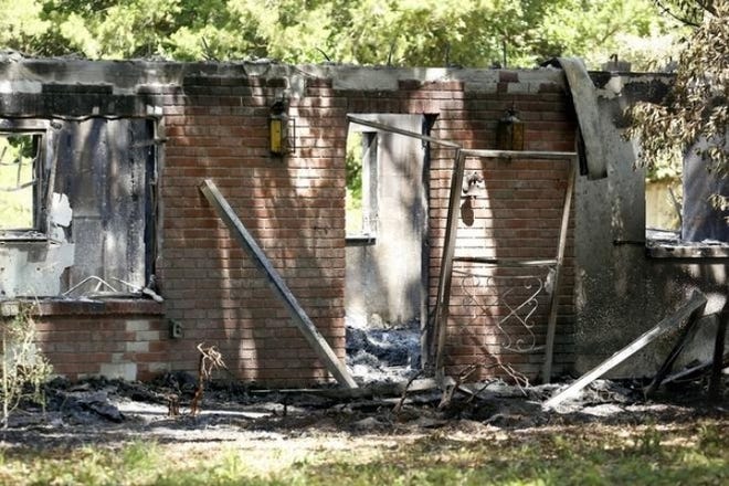 The burned home of John Hubert Highnote in Bell, Florida, on Friday, May 4, 2018. [Brad McClenny/The Gainesville Sun]