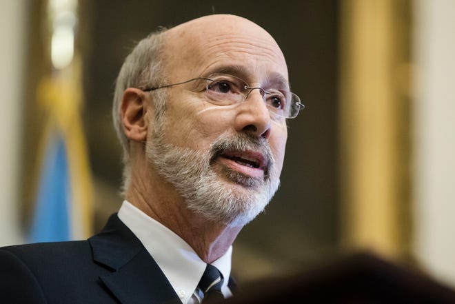 Pennsylvania Gov. Tom Wolf speaks before vetoing a bill passed by the Republican-controlled Legislature to limit abortions to the first 20 weeks of pregnancy at City Hall in Philadelphia, Monday, Dec. 18, 2017. [AP Photo/Matt Rourke]