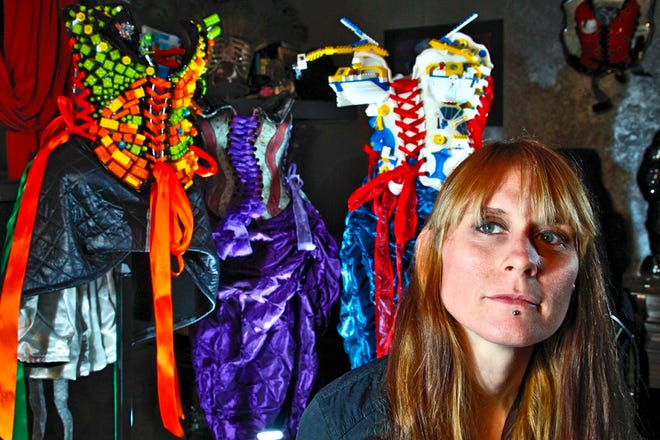 Oklahoma City artist Nicole Moan poses for a photo with her ceramic corsets on Tuesday, Nov. 22, 2011 in Oklahoma City, Okla. Photo by Chris Landsberger, The Oklahoman Archives