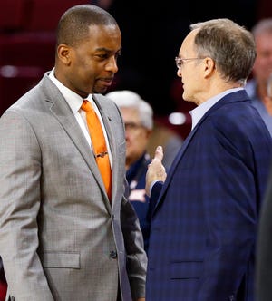 Oklahoma State head coach Mike Boynton, left, and Oklahoma head coach Lon Kruger talk before a Bedlam men's college basketball game between the Oklahoma Sooners (OU) and the Oklahoma State Cowboys (OSU) at the Lloyd Noble Center in Norman, Okla., Saturday, Jan. 5, 2019. Photo by Nate Billings, The Oklahoman