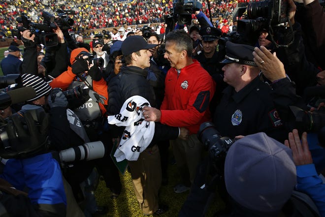 Michigan coach Jim Harbaugh went winless in four attempts against Ohio State under Meyer. [Eamon Queeney/Dispatch]