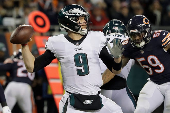 Philadelphia Eagles quarterback Nick Foles passes during the first half of a wild-card playoff football game against the Chicago Bears. (AP Photo/Nam Y. Huh)