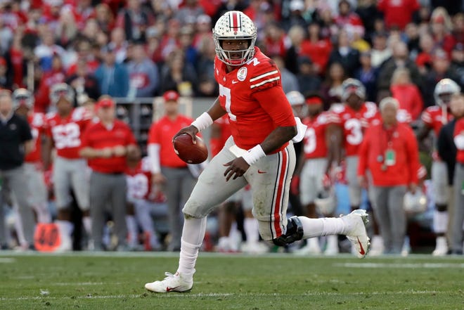 Record-setting Ohio State quarterback Dwayne Haskins Jr. says he is leaving school to enter the NFL draft. [AP File Photo]