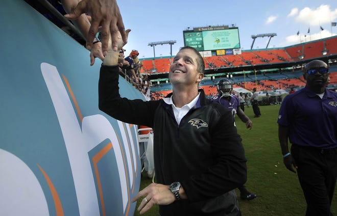 John Harbaugh? Well, yeah, of course the Dolphins should try to acquire the Ravens coach. [BILL INGRAM/palmbeachpost.com]