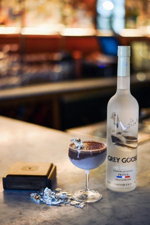 The Chocolate Martini at Academia is priced at $100 in part because it features a chocolate liqueur made from rare cacao harvested from Ecuador. [Contributed by Academia]