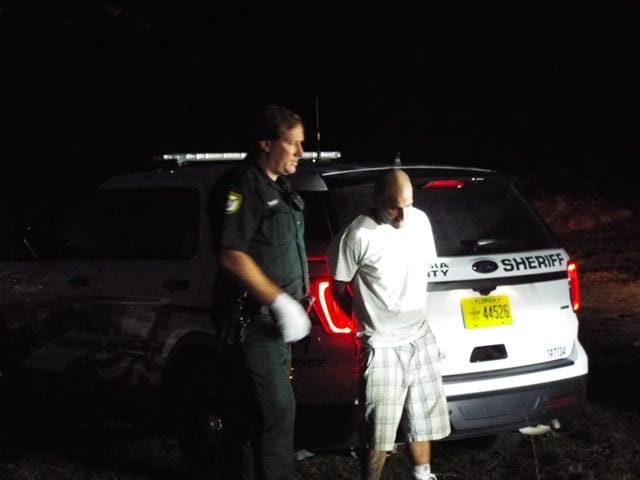 Volusia deputies gather at State Road 40 and Country Road 3 on Tuesday evening where suspect Anthony Gunther, 34, tried to carjack a pickup. A deputy foiled the carjacking by using his Taser on the suspect. The suspect was trying to escape after getting shot at by a Pierson resident at a convenience store, officials said. [News-Journal/Patricio G. Balona]