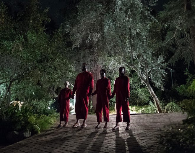 This image released by Universal Pictures shows a scene from Jordan Peele's upcoming film, "Us," which will make its world premiere at the South by Southwest Film Festival. (Claudette Barius/Universal Pictures via AP)