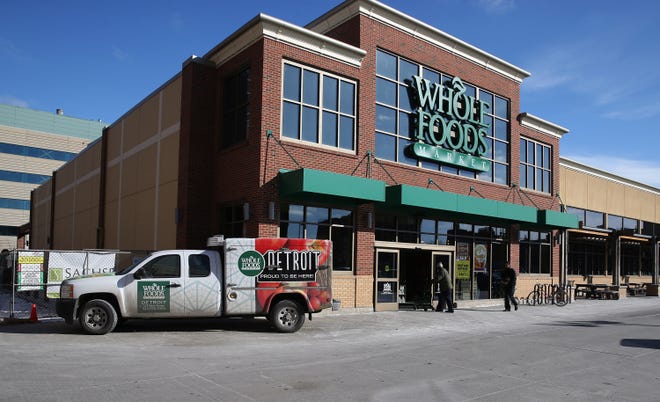 A Whole Foods Market location in Detroit. Amazon's $13.7 billion acquisition of Whole Foods means building growth will be back on track, an executive said. [Terrence Antonio James/Chicago Tribune]
