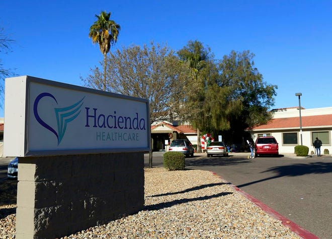 This Friday, Jan. 4, 2019, photo shows Hacienda HealthCare in Phoenix. The revelation that a Phoenix woman in a vegetative state recently gave birth has prompted Hacienda HealthCare CEO Bill Timmons to resign, putting a spotlight on the safety of long-term care settings for patients who are severely disabled or incapacitated.
