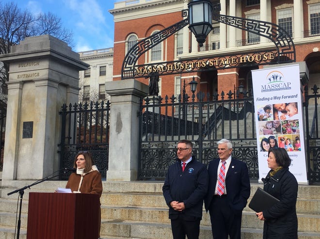 Liz Berube of Fall River's Citizens for Citizens joined advocates and lawmakers, including Sen. Michael Rodrigues, Rep. Paul Donato, and Sen. Jo Comerford, to call for state funding for a low income heating program. [Photo: Kaitlyn Budion/SHNS]