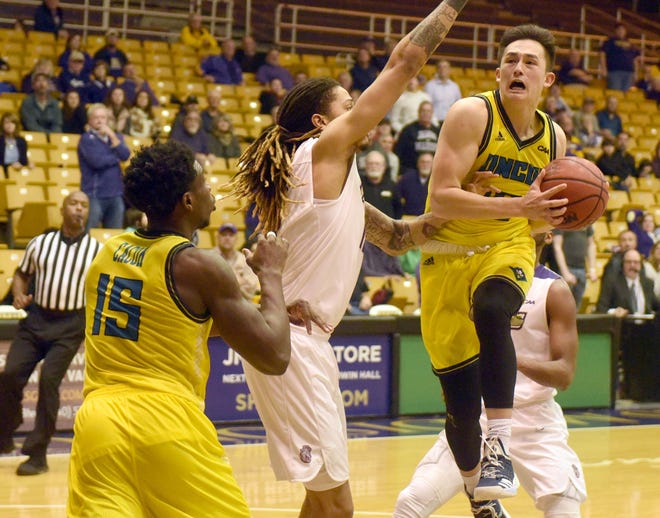 UNCW guard Kai Toews, right, and forward Devontae Cacok (15) provide the Seahawks with two players who rank among the top 5 nationally in different statistical catgories. [Alex Riley/StarNews]