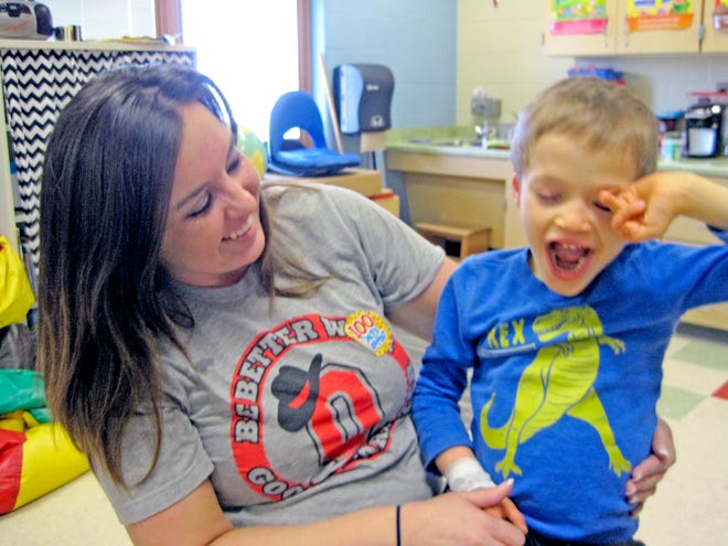 Orrville Elementary School teacher Brianna Hinkle praised the life lessons taught by her late pupil, Sawyer Carpenter, a 7-year-old who transcended a rare disorder to share his love for others.