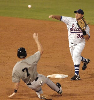 Former Jacksonville Suns infielder Kevin Randel, shown turning a double play against the New Orleans Zephyrs in a 2009 exhibition, was named the new manager of the Jumbo Shrimp Thursday. [John Pemberton/Florida Times-Union/file]