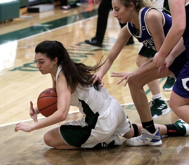 Cierra Nightingale of Mendon dives for a loose ball against Cassopolis in the Lady Hornets win at home on Friday night.
