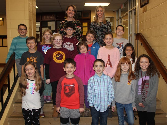 Members of Ann Walsh's third grade class at the Brown School gave a presentation to the Swansea School Committee Monday night. Shown here in front are Emma Guerra, Zackary Banville, Jacob Arruda, Julia Lolyd and Riley Tetlow. Second row: Matthew DeCoste, Hailey Kubicek, April Geiger, Sophia Duarte and Avery Dufault. Next row: Nathan Lambert, Alice Hennessey, Matheus Porto, Jet Almeida and Travis Varao. In back are teachers Ann Walsh and Alison Benfeito. PHOTO BY BILL HALL/THE SPECTATOR/SCMG