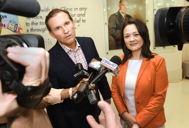 Jacksonville Mayor Lenny Curry, left, is seeking re-election in the March city election against challenger and City Councilwoman Anna Lopez Brosche, right. [Bob Self/Florida Times-Union]