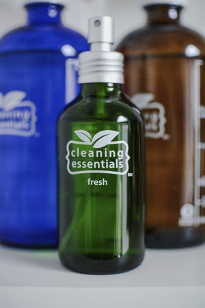 This photo provided by Cleaning Essentials shows some of the company's reusable glass cleaning bottles available online and in stores. [ALI RAINER/CLEANING ESSENTIALS via AP]