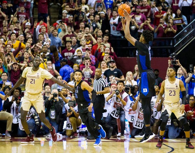 Duke forward Cam Reddish takes the game-winning shot against Florida State with less than a second left in an NCAA college basketball game in Tallahassee, Fla., Saturday, Jan. 12, 2019. Duke defeated Florida State 80-78. (AP Photo/Mark Wallheiser)
