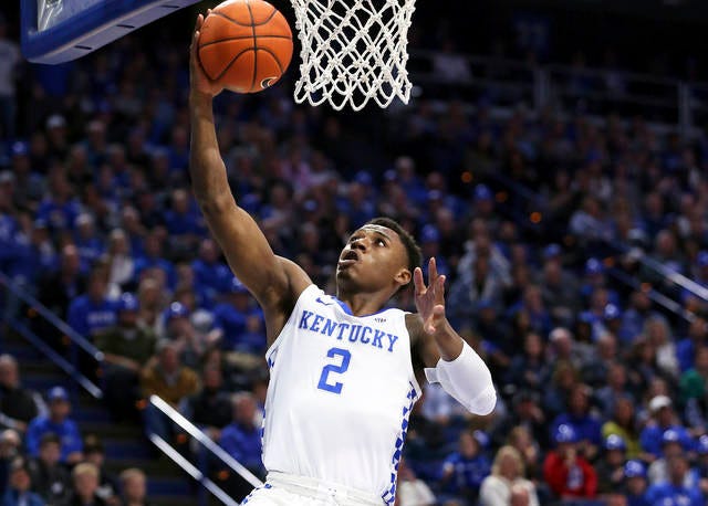 Kentucky’s Ashton Hagans (2) gets an uncontested layup during the first half of an NCAA college basketball game against Vanderbilt in Lexington, Ky. on Saturday. (James Crisp/The Associated Press)
