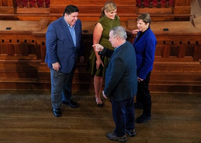 Ted Schurter/GATEHOUSE MEDIA ILLINOIS

Governor-elect JB Pritzker and his wife M.K. Pritzker laugh with U.S. Sen. Dick Durbin, D-Illinois, and his wife, Loretta, during an open house Sunday at the Old State Capitol in Springfield.