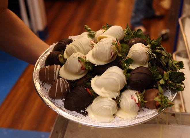 Chocolate-covered strawberries on a plate at Peterbrooke Chocolatier in Tuscaloosa. [Staff file photo/The Tuscaloosa News]