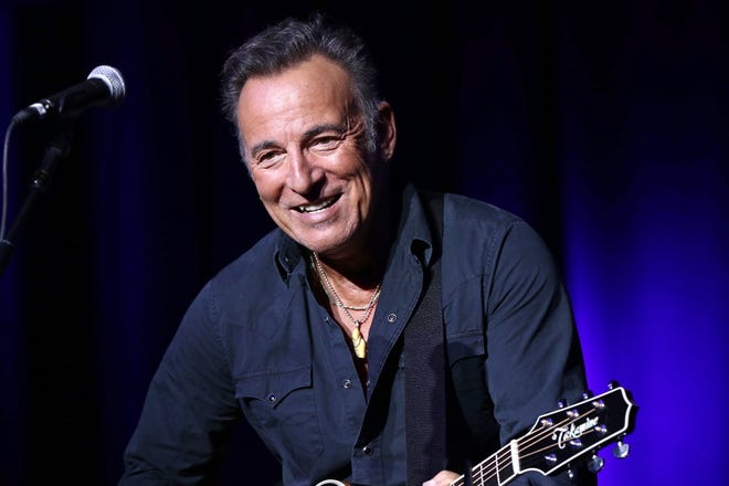 FILE - In this Nov. 10, 2015 file photo, Bruce Springsteen performs at the 9th Annual Stand Up For Heroes event in New York. [Photo by Greg Allen/Invision/AP, File]