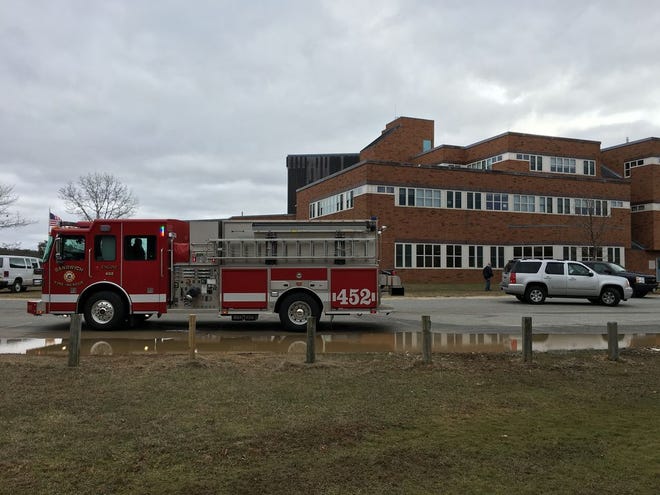 Officials are investigating the source of a water main break at Sandwich High School. Students were sent home early because of the break and a lack of running water and sprinklers at the school.