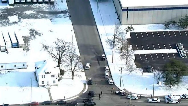 Police respond to a report of an active shooter at a United Parcel Service facility in Logan Township, N.J., Monday, Jan. 14, 2019. (WPVI via AP)