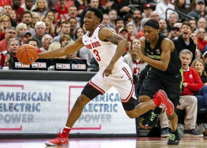 Ohio State captain C.J. Jackson, making a steal against Michigan State on Jan. 5, said he needs to set a better example for his team, including working harder in practice. [Tyler Schank]