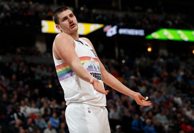 Denver Nuggets center Nikola Jokic argues for a foul in the second half of an NBA basketball game against the Portland Trail Blazers Sunday, Jan. 13, 2019, in Denver. The Nuggets won 116-113. (AP Photo/David Zalubowski)