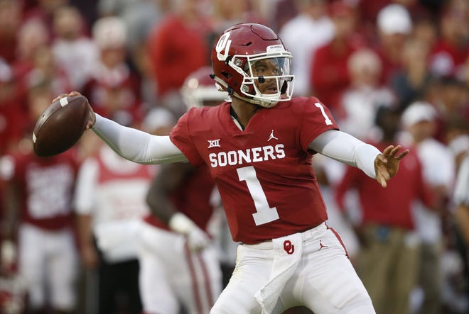 In this Sept. 22, 2018, file photo, Oklahoma quarterback Kyler Murray (1) throws in the first half of an NCAA college football game against Army, in Norman, Okla. Kyler Murray, the first-round Major League Baseball draft pick and Heisman Trophy-winning Oklahoma quarterback, says he is declaring himself eligible for the NFL draft. [AP Photo/Sue Ogrocki, File]