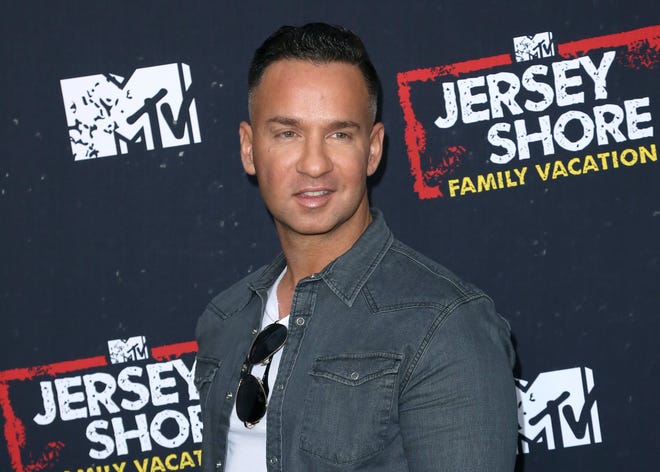 In this March 29, 2018 file photo, Mike "The Situation" Sorrentino arrives at the "Jersey Shore Family Vacation" premiere in Los Angeles. [Willy Sanjuan/Invision/AP, File]