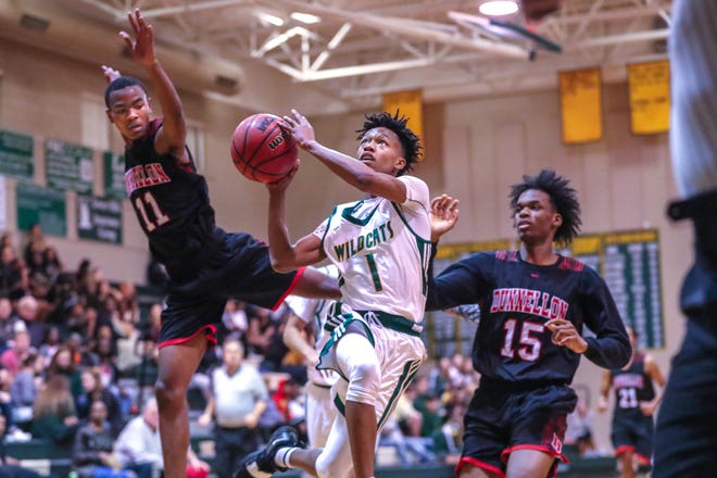 Forest's Zay Christie scored 13 points and had nine assists in the Wildcats' 65-49 win over Dunnellon on Monday. [Submitted photo by Chris M. Spears]