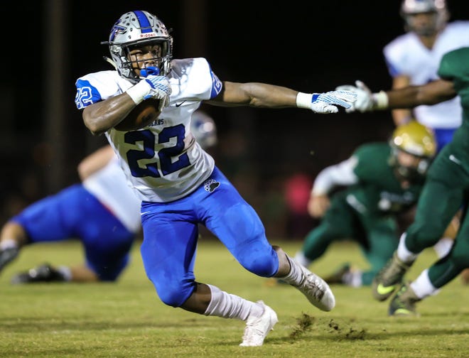 Bartram Trail running back Devin Ellison (22) will play for Georgia Tech next season, but the Bears, who missed the playoffs in 2018, will continue to play a tough schedule which should help their playoff chances under a proposed RPI-style system. [GARY LLOYD McCULLOUGH/CORRESPONDENT]