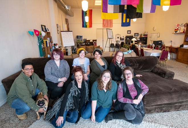 Members of the board of the local PFLAG chapter pose in their new location at 8 East 13th Avenue, Saturday, Jan. 12, 2019. Several members of the board were not present for this photo. [Jesse Brothers/HutchNews]