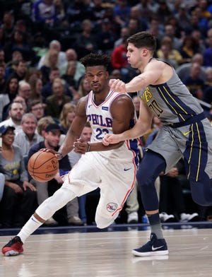 Jimmy Butler led the 76ers with 27 points in their 120-96 win against the Pacers. [Michael Conroy / Associated Press]