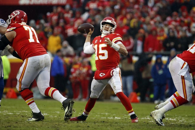 Kansas City Chiefs quarterback Patrick Mahomes (15) throws a pass during a playoff game against the Indianapolis Colts on Saturday in Kansas City, Mo. [AP Photo/Charlie Riedel]