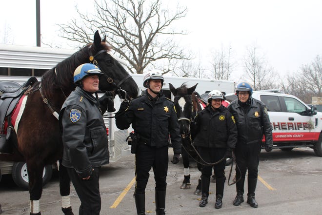 These proud members of the Mounted Patrol Unit are welcomed to their new home on the Livingston County Mounted Patrol Unit. PHOTOS BY JASMINE WILLIS