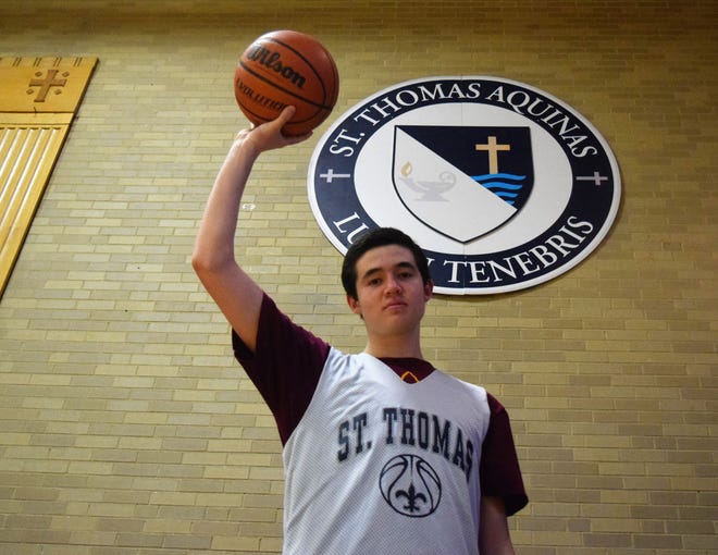 Senior forward Andrew Cavanaugh and the St. Thomas Aquinas boys basketball team brought a 5-1 record into Thursday night's game against Prospect Mountain, and hope to be contenders in Division III. [Mike Zhe/Seacoastonline]
