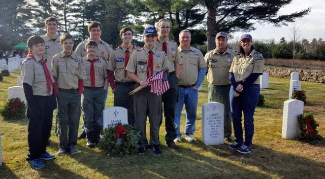 On Dec. 15, Troop 477 BSA Leominster participated in Wreaths Across America. The Scouts laid wreaths in honor and remembrance of veterans at the Fort Devens Post Cemetery in Devens. [SUBMITTED PHOTO]