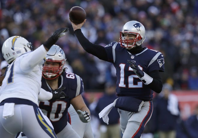 Tom Brady and New Orleans' Drew Brees are experienced veterans who will do battle against two up-and-coming quarterbacks in their NFL conference championship matchups on Sunday. [CHARLES KRUPA/THE ASSOCIATED PRESS]
