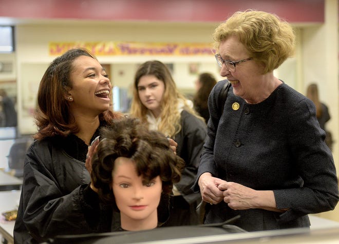 Anaijah Crichlow, a cosmetology student at Middle Bucks Institute of Technology, talks with state Rep. Wendy Ullman, D-143, Friday, as state officials tour the Warwick school to highlight the need for state investments in career and technical education. [KIM WEIMER / STAFF PHOTOJOURNALIST]