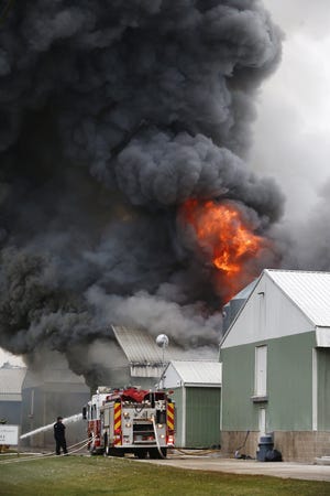 A three-alarm fire at Trillium Farms in western Licking County on Nov. 30 destroyed a pullet barn. Hartford Volunteer Fire Department dispatchers said the large fire was reported about 1:30 p.m. at one of the barns at the farm at 12280 Croton Road NW. [Fred Squillante/Dispatch]