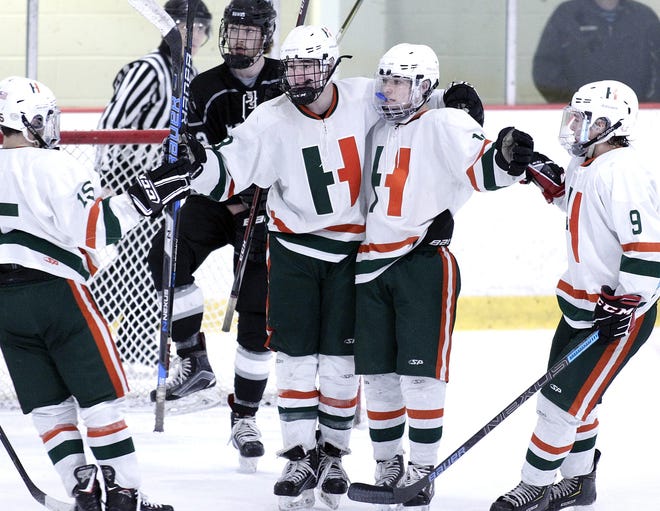 Hopkinton's Tommy Hamblet (second from left), pictured getting congratulated by teammates earlier in the season, scored the lone goal for the Hillers in a 1-0 victory over Holliston on Satuday. [Daily News and Wicked Local File Photo/Marshall Wolff]