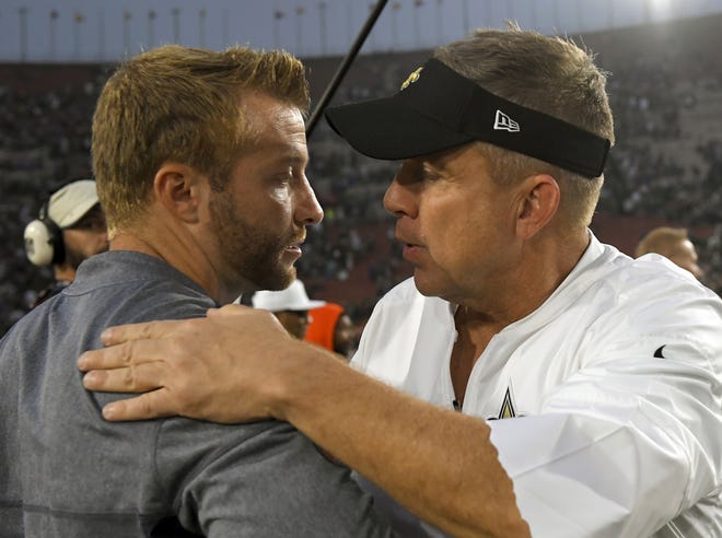 Rams coach Sean McVay, left, greets Saints coach Sean Payton after a Nov. 26, 2017 game in Los Angeles. The Rams and Saints play in the NFC conference championship on Sunday in New Orleans. [MARK J. TERRILL/AP FILE PHOTO]