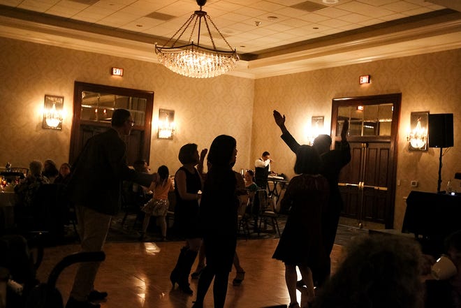 Guests dance at the "Winter Wonderland" party for the National Treasury Employees Union Chapter 247. The soiree took place Saturday at the Omni Austin Hotel Southpark in South Austin. [ARIANA GARCIA/AMERICAN-STATESMAN]
