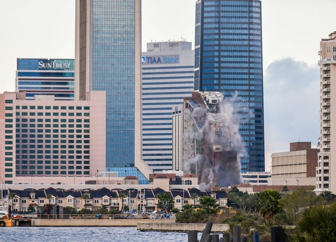 The old City Hall building, more recently known as the City Hall Annex, is imploded Sunday morning, January 20, 2019 in Jacksonville, Florida.  [Will Dickey/Florida Times-Union]