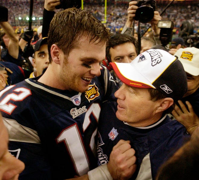 FILE - In this Feb. 1, 2004, file photo, New England Patriots MVP quarterback Tom Brady (12) and head coach Bill Belichick embrace after defeating the Carolina Panthers 32-29 in Super Bowl XXXVIII in Houston. The Patriots have dominated the AFC for nearly two decades _ if not the entire NFL _ and the coach-quarterback combination of Bill Belichick and Tom Brady will be playing in their eighth conference title game Sunday, Jan. 20, 2019, when New England visits the Chiefs at frigid, hostile Arrowhead Stadium. (AP Photo/David J. Phillip, File)