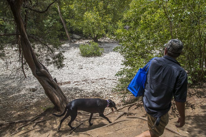 Twin Falls, a popular swimming creek on the greenbelt in Austin, dried up last August due to the Texas drought. [RICARDO B. BRAZZIELL / AMERICAN-STATESMAN]
